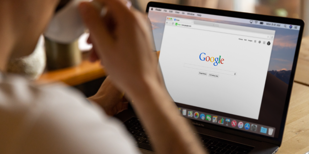 A person uses Google search to find information about local businesses.